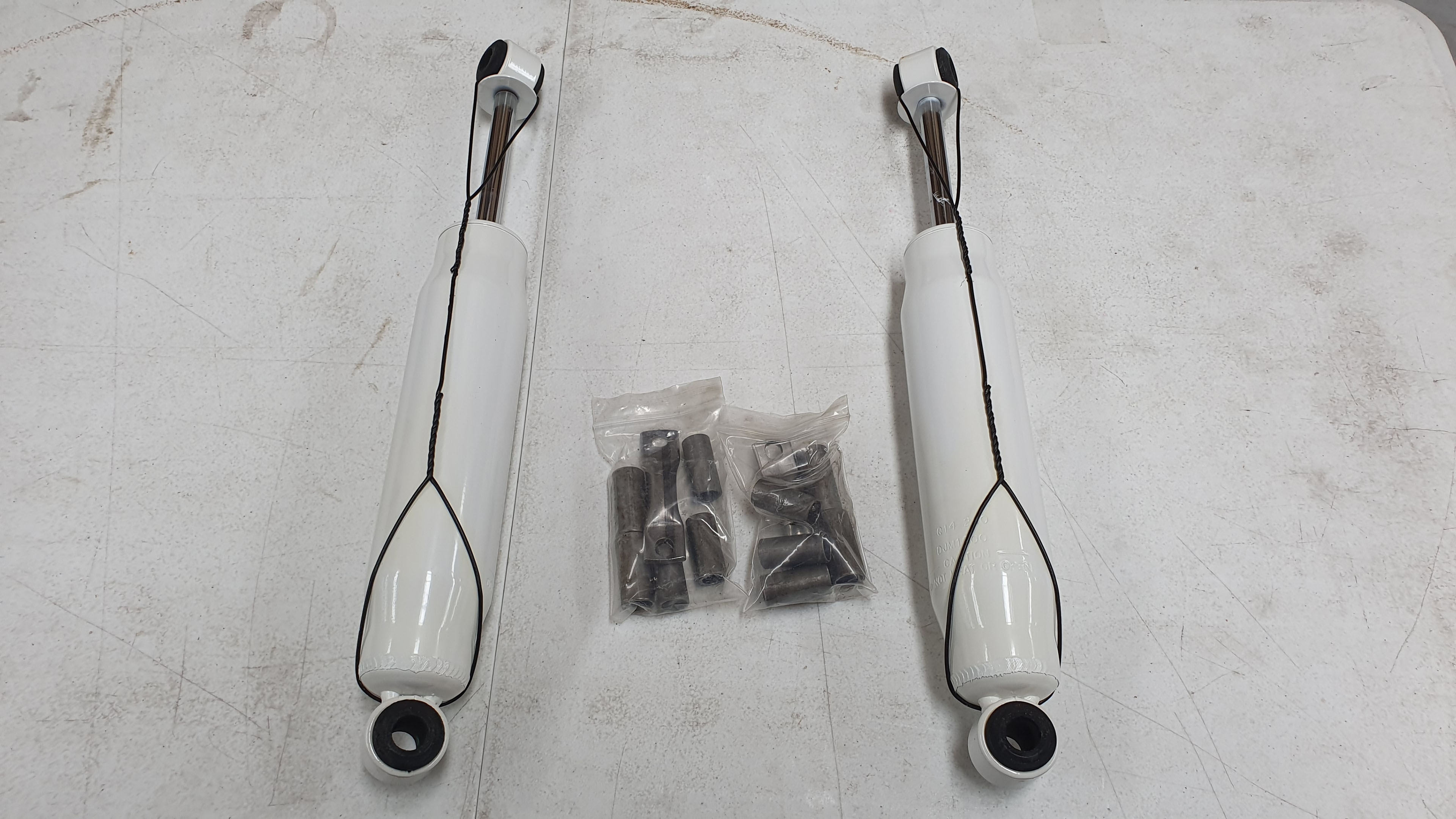 Ford F100 DJM Suspension - Rear Calmax Supershocks 19.5 Inch Loop / Loop (Pair)