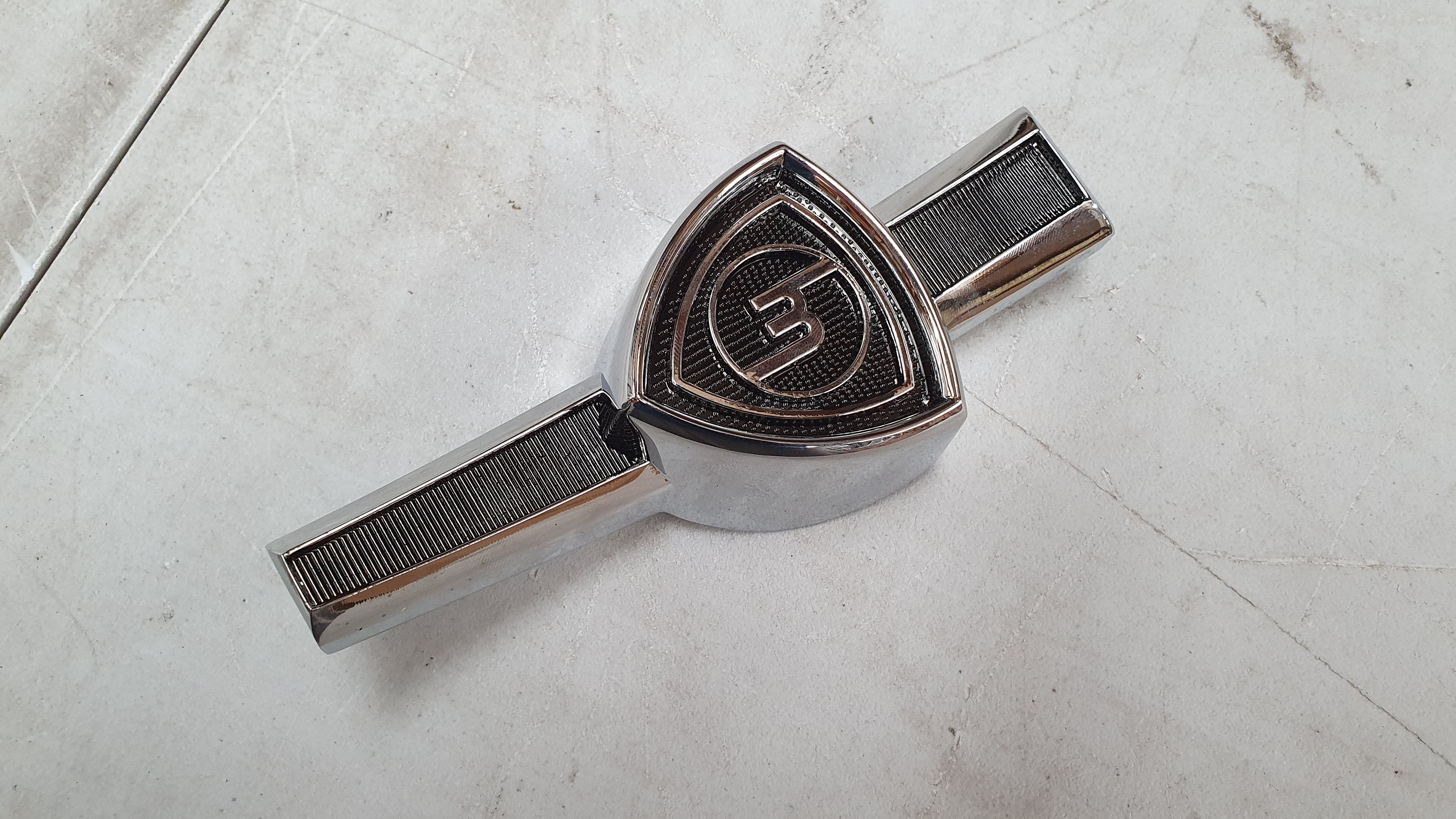 Mazda R100 10A Series 1 Grille Badge